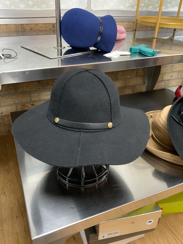 Hat Black  with a little Gold Brim