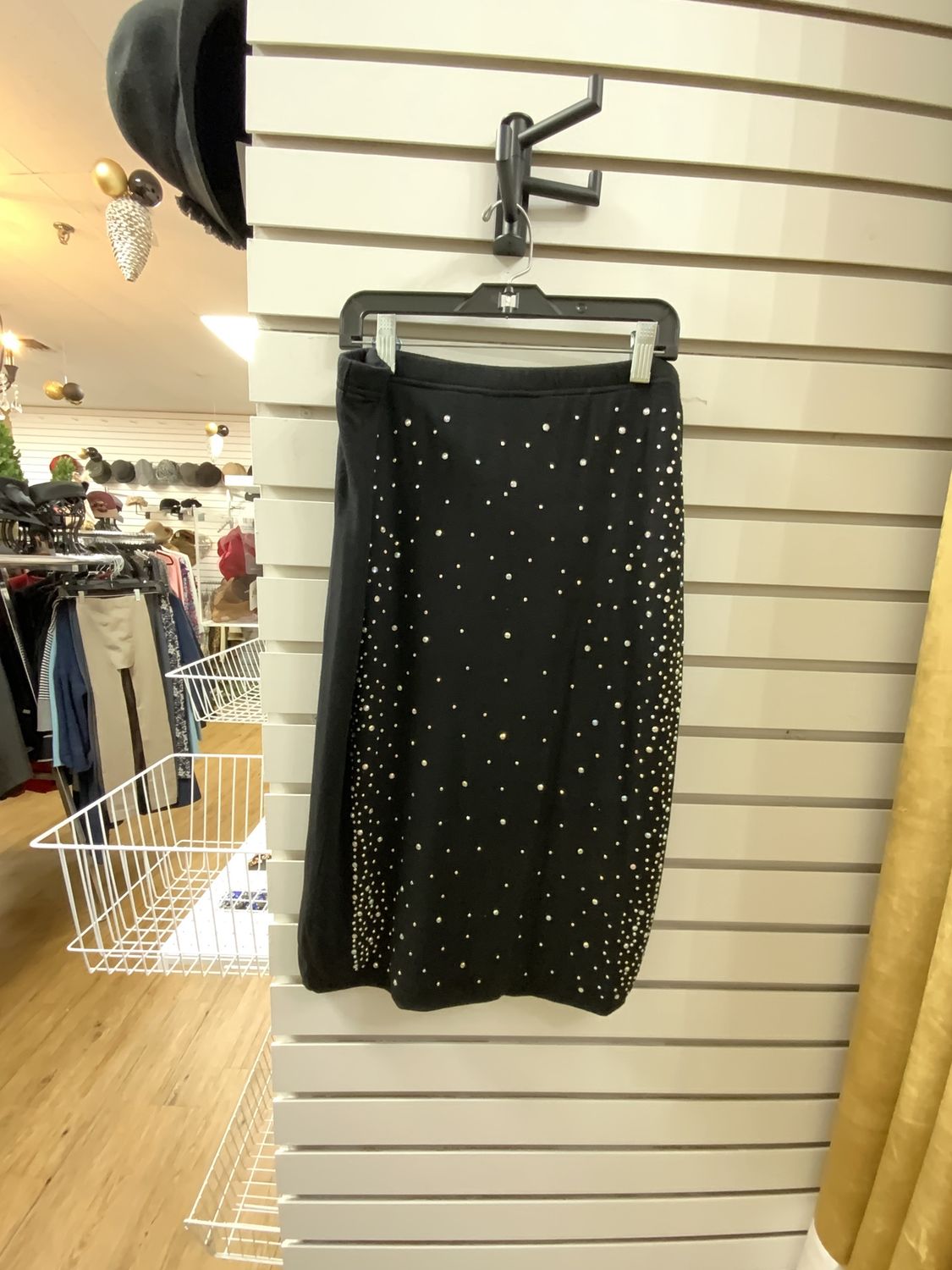 Woman Black with Iridescent Stones in the Front Knit Size Large