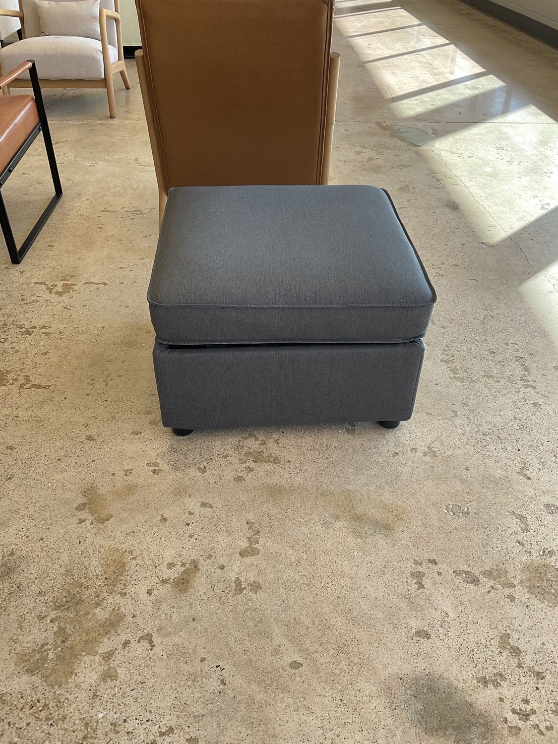 Gray storage ottoman