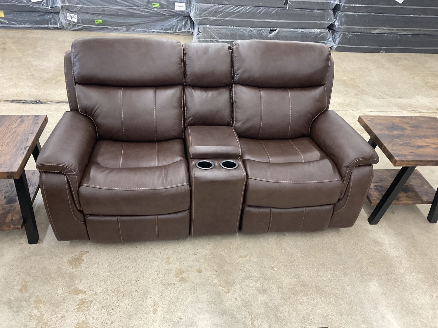 Brown leather console loveseat