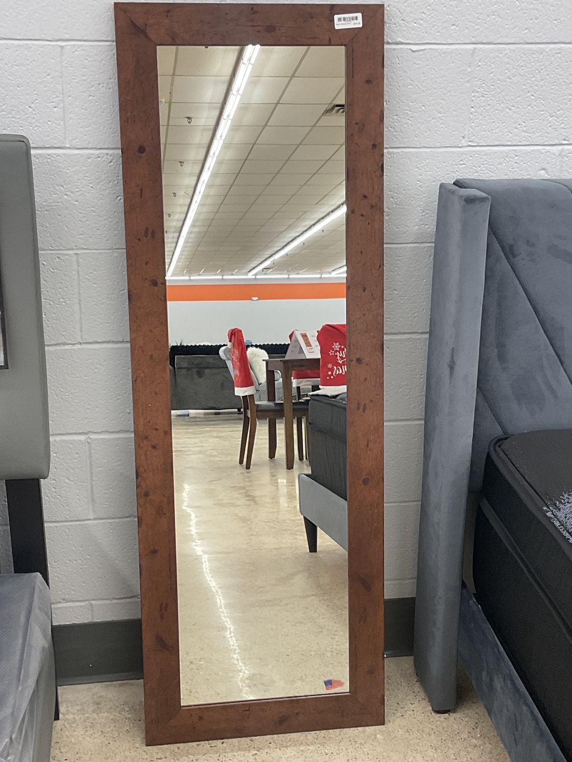 Brown leaning mirror