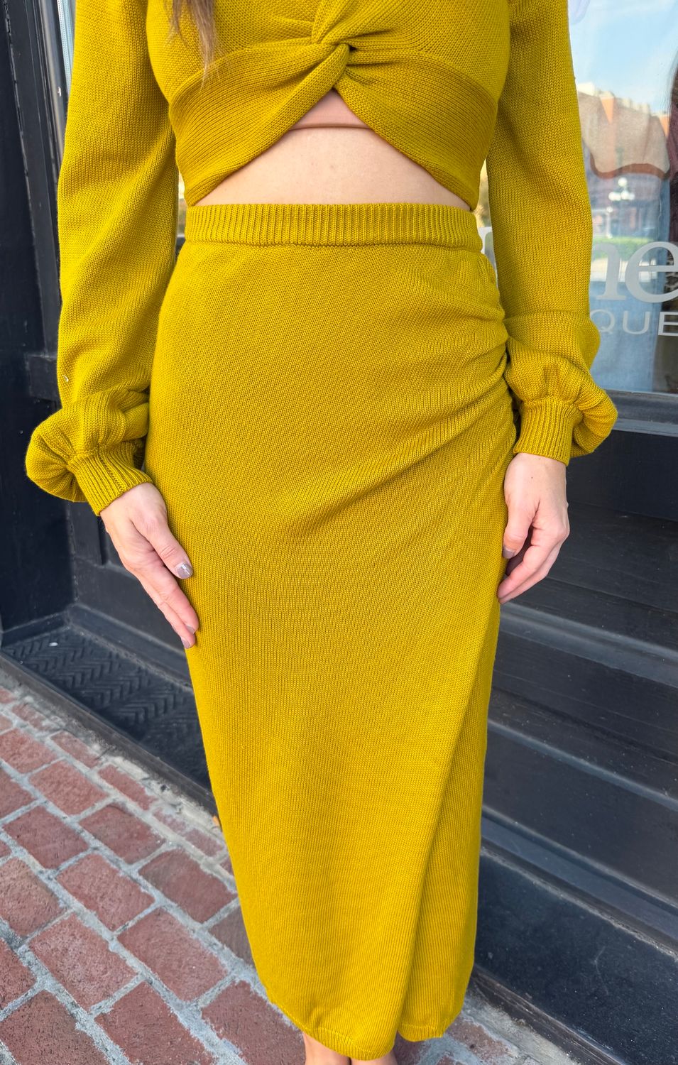 OLIVE TWIST PENCIL MIDI SKIRT