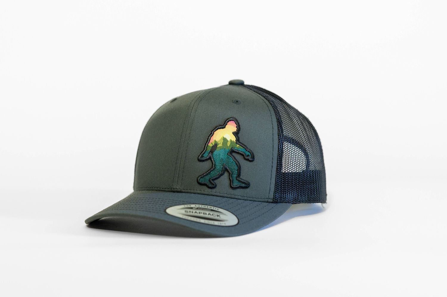 Adventure Sasquatch Trucker Hat: Charcoal / Black