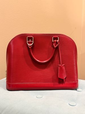 Louis Vuitton Alma Handbag