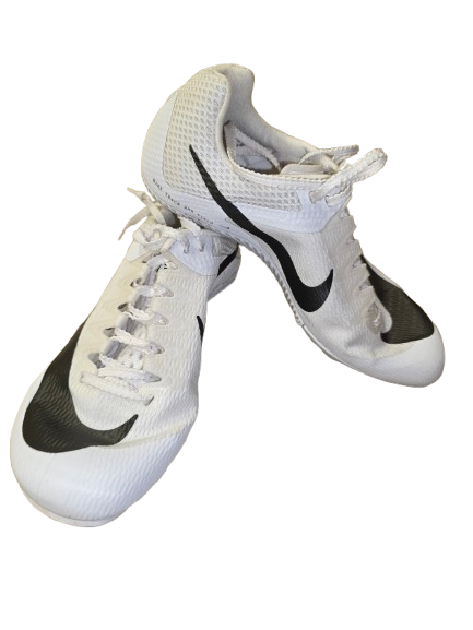 Kids black and white Nike Sprinter Cleats