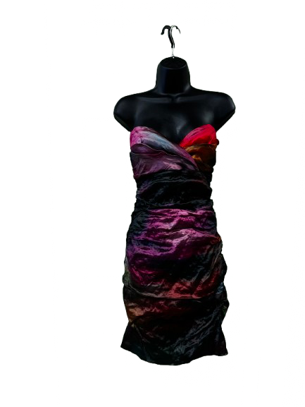strapless mini dress features a vibrant ombre gradient and flattering ruched detailing