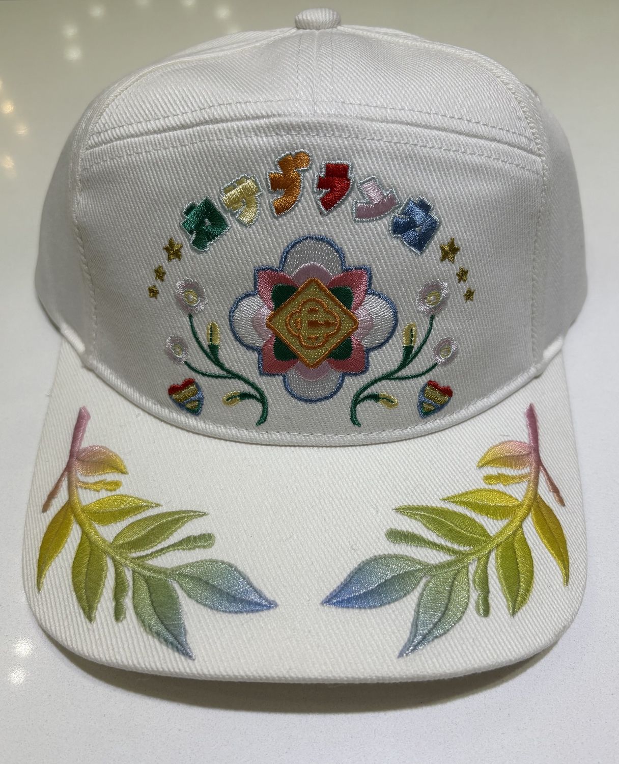 SEASONAL GRADIENT LAUREL CAP