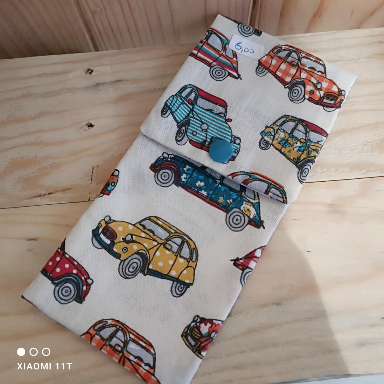 pochette longue en tissu enduit voiture