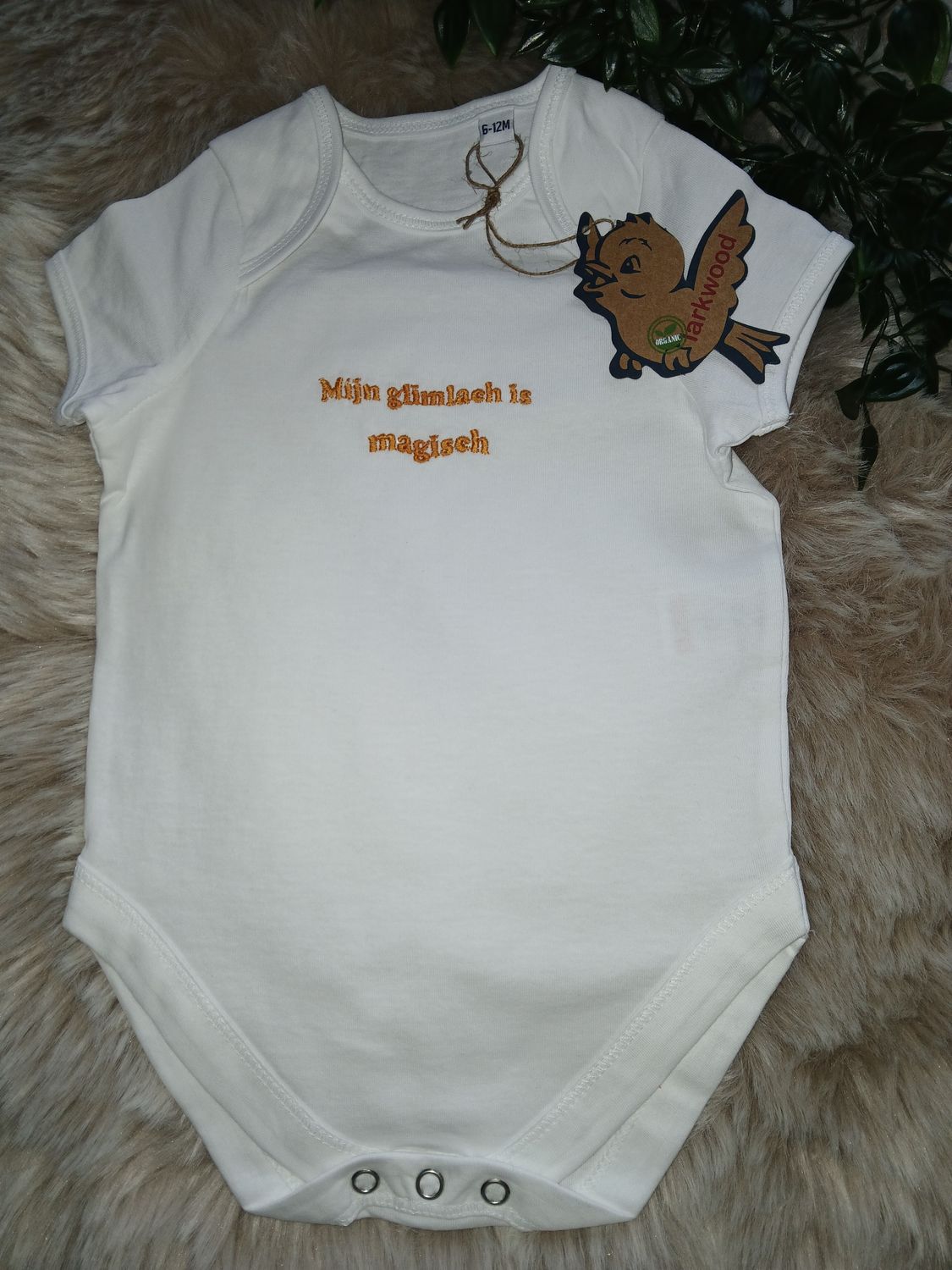 Body 6-12 M : Mijn glimlach is magisch.