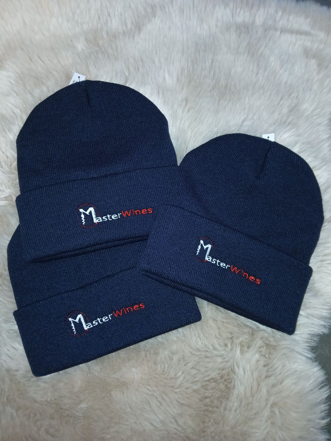 Bedrijfslogo op muts.