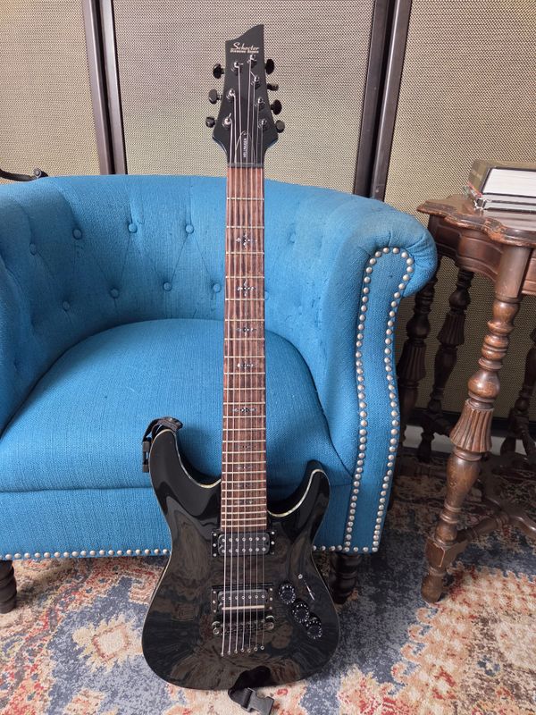 Used Schecter Hellraiser C-7 7 string black w/case
