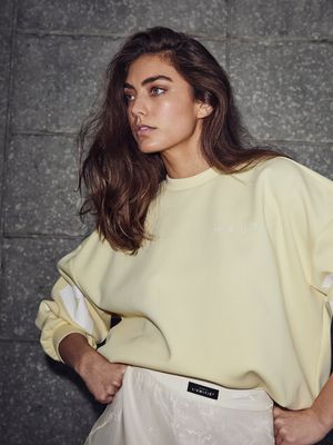 Haute l'Amitié Maxi Split Logo Sweat Pale Yellow