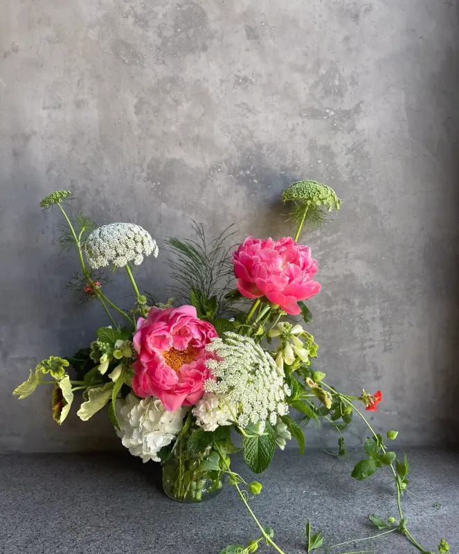 PeonyMania arrangement with hot pink peonies, white hydrangea, and Queen Anne's lace by Le Bouquet San Francisco