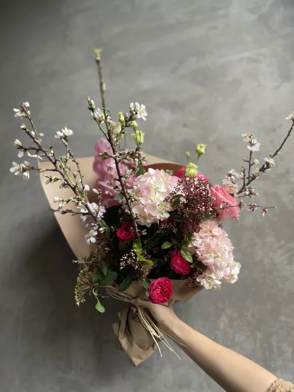 Custom wrapped Valentine's bouquet with cherry blossoms pink roses and seasonal flowers San Francisco