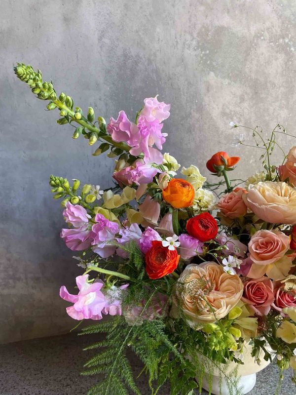 Your Choice Mother's Day arrangement with sweet peas, ranunculus, garden roses, and snapdragons by Le Bouquet SF
