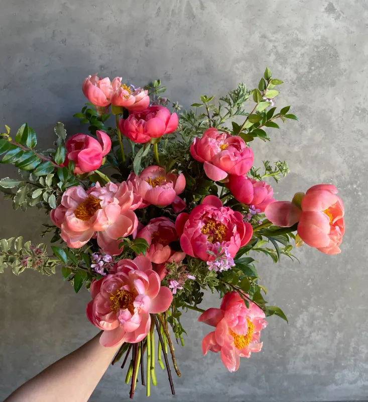 Peony Lover bouquet with coral peonies and supporting greens by Le Bouquet SF