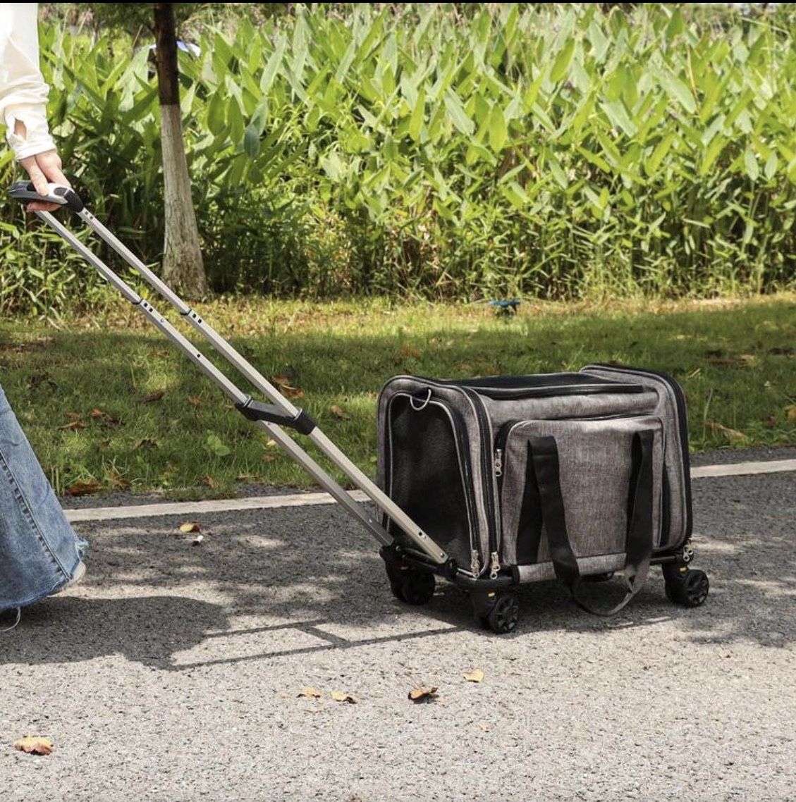 Cat Carrier with wheels Airline Airport Approved with telescopic handle and feeding bowl.