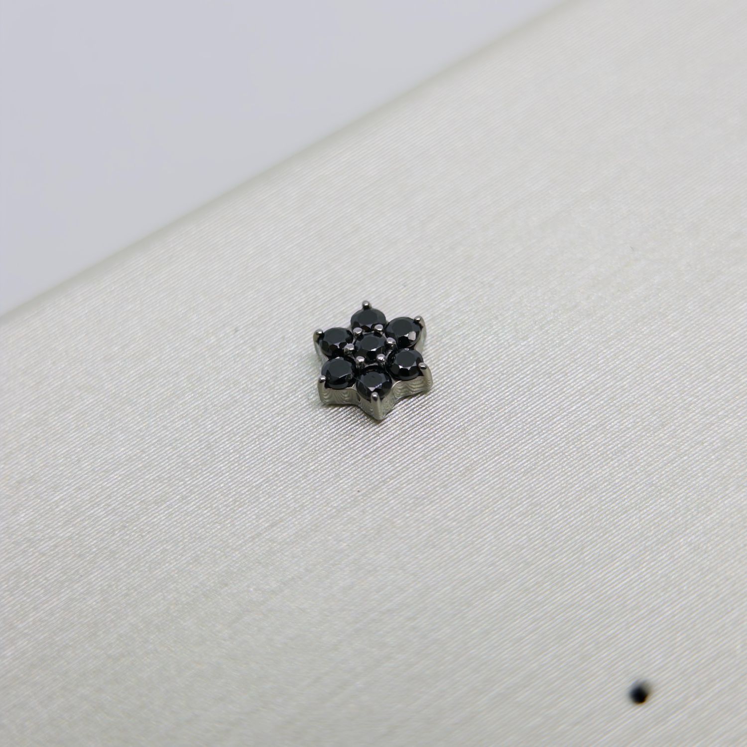 Black 6 Petal Flower