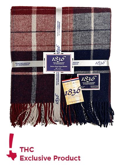  Direct photo of folded knee blanket showcasing pattern and packaging with "THC Exclusive Product" icon.