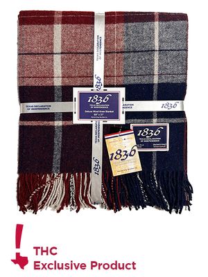  Direct photo of folded knee blanket showcasing pattern and packaging with "THC Exclusive Product" icon.