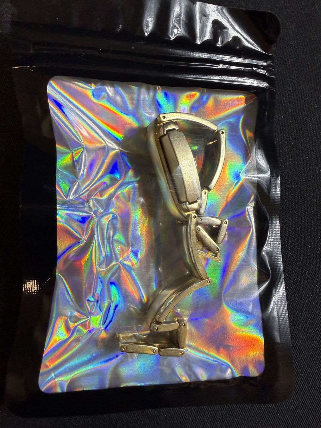 Royalton Gold toned Peek-a-boo slide Watch