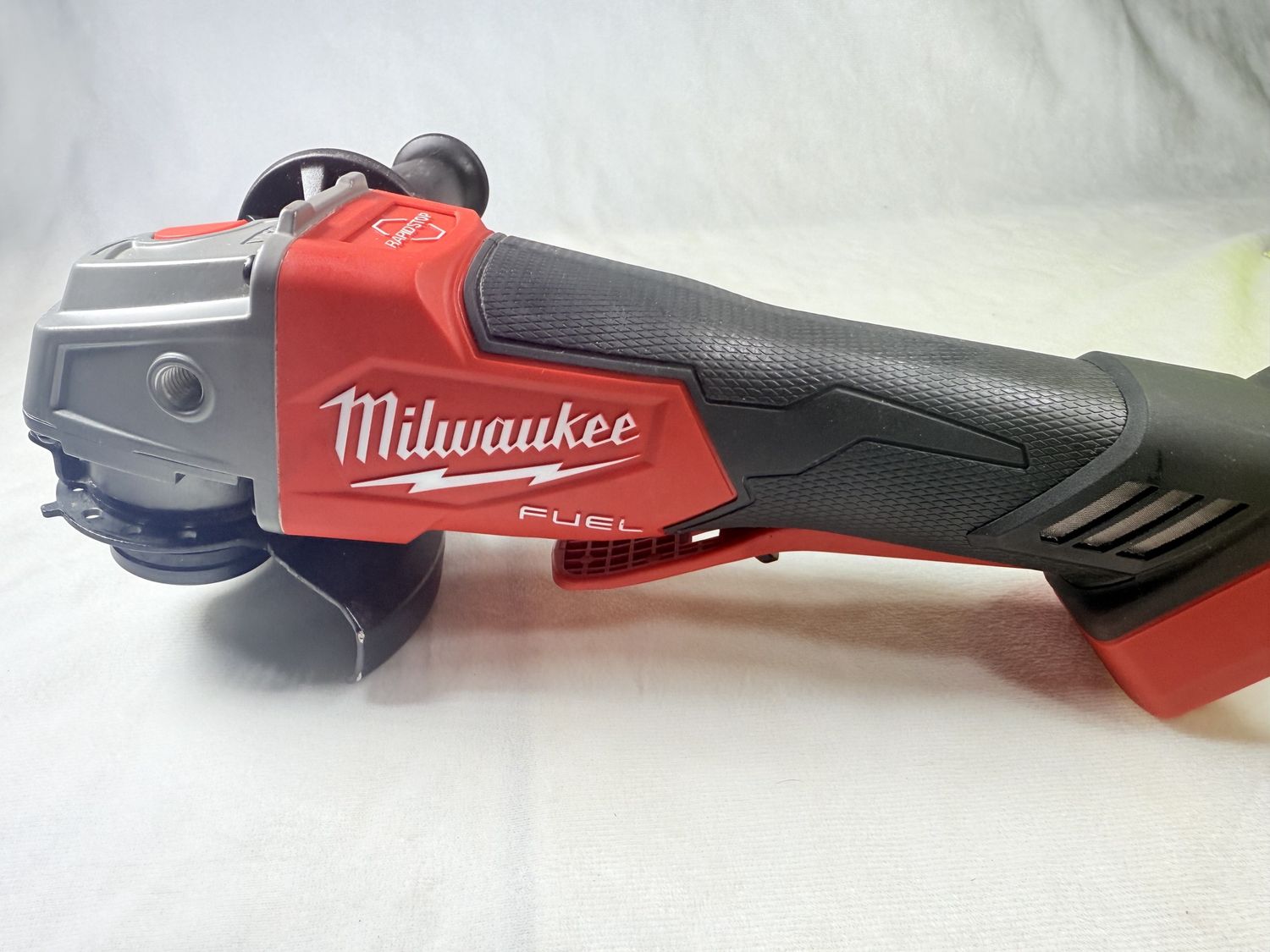 M18 FUEL 18V Lithium-Ion Brushless Cordless 4-1/2 in./5 in. Grinder w/Paddle Switch (Tool-Only), Condition: Used-like new