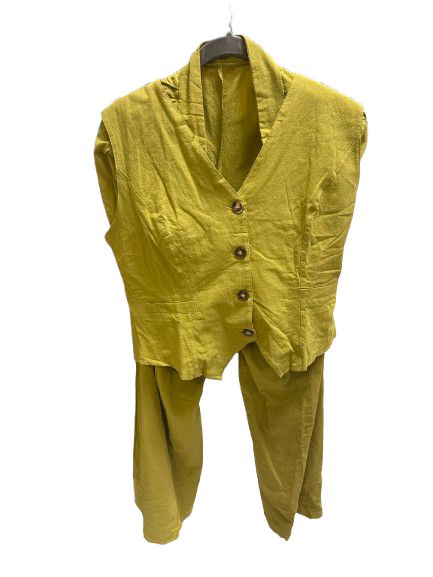 sleeveless cotton linen vest and wide-leg trousers two-piece pant suit in a mustard or olive green color.