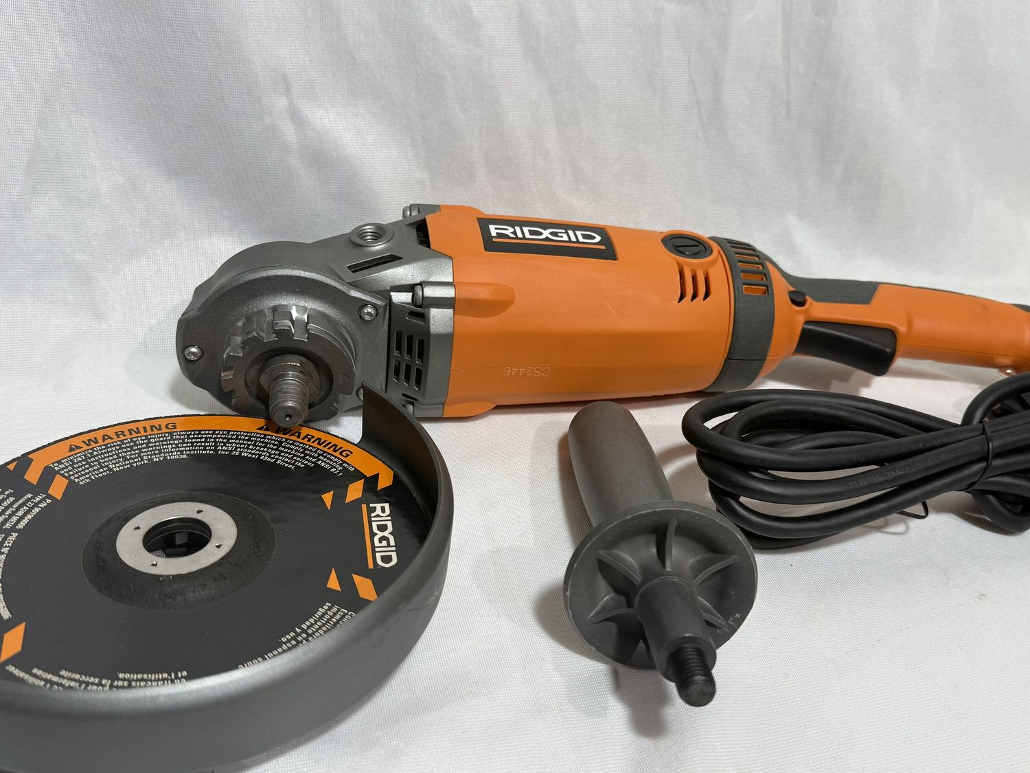 R10202 15 Amp Corded 7 in. Twist Handle Angle Grinder, Condition: new