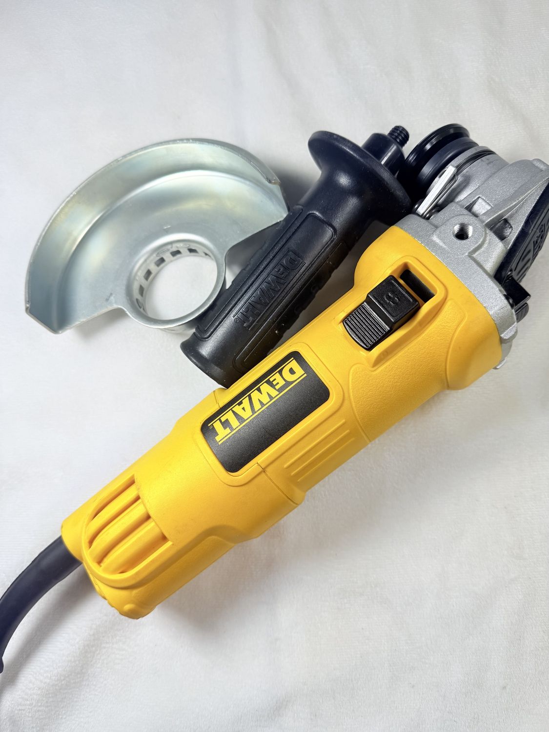 DWE4011 7 Amp 4.5 in. Small Corded Angle Grinder with 1-Touch Guard, Condition: New