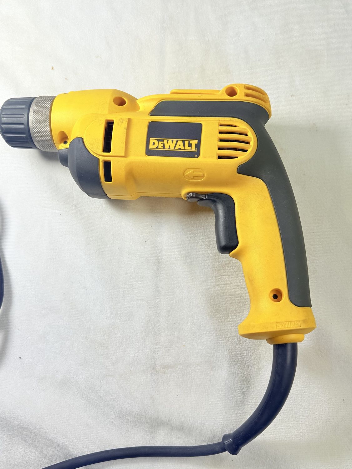 DWD110K 8 Amp Corded 3/8 in. Variable Speed Drill, Condition: Used-like new