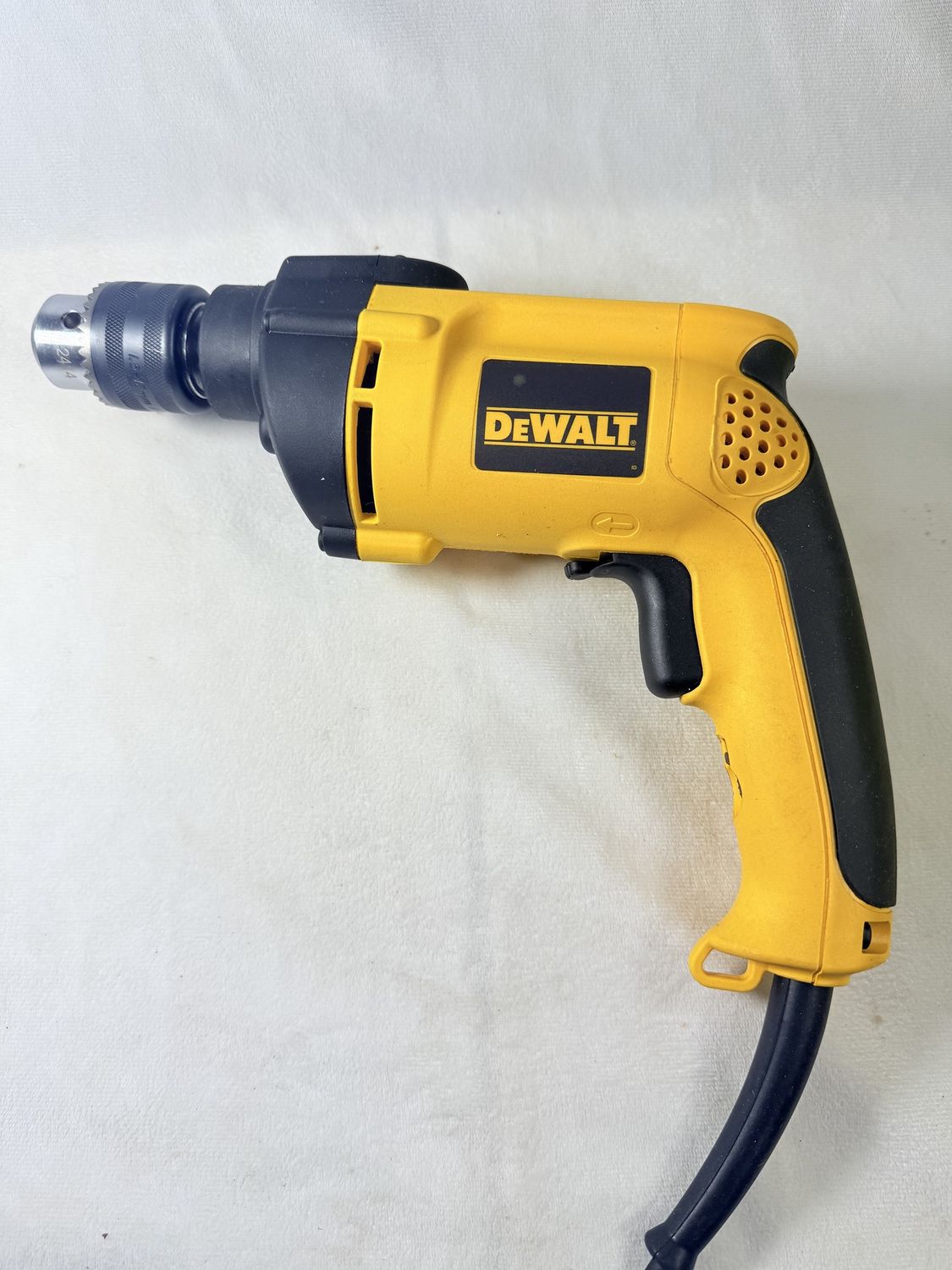 DW511 7.8 Amp Corded 1/2 in. Variable Speed Reversible Hammer Drill, Condition: New