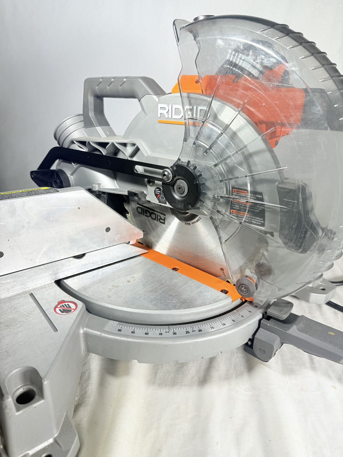R4113 15 Amp 10 in. Corded Dual Bevel Miter Saw with LED Cut Line Indicator, Condition: Used