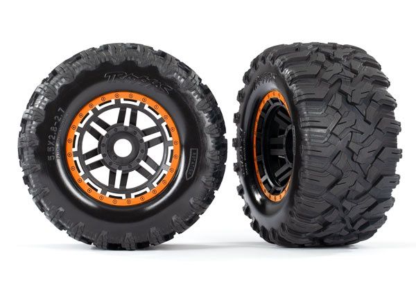 TRA8972T Tires &amp; wheels, assembled, glued (black, orange beadlock style wheels, Maxx MT tires, foam inserts) (2) (17mm splined) (TSM rated
