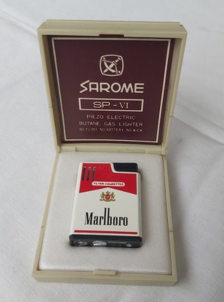 Tobacciana Accendino Marlboro Piezo Electric Lighter Sarome SP-VI Ricaricabile Gas Tobacciana Accendino Marlboro Piezo Electric Lighter Sarome SP-VI Ricaricabile Gas