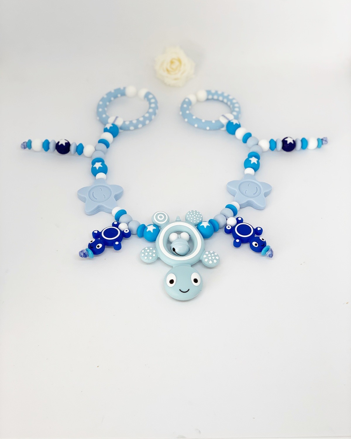 Kinderwagen Kette mit Trulla blau