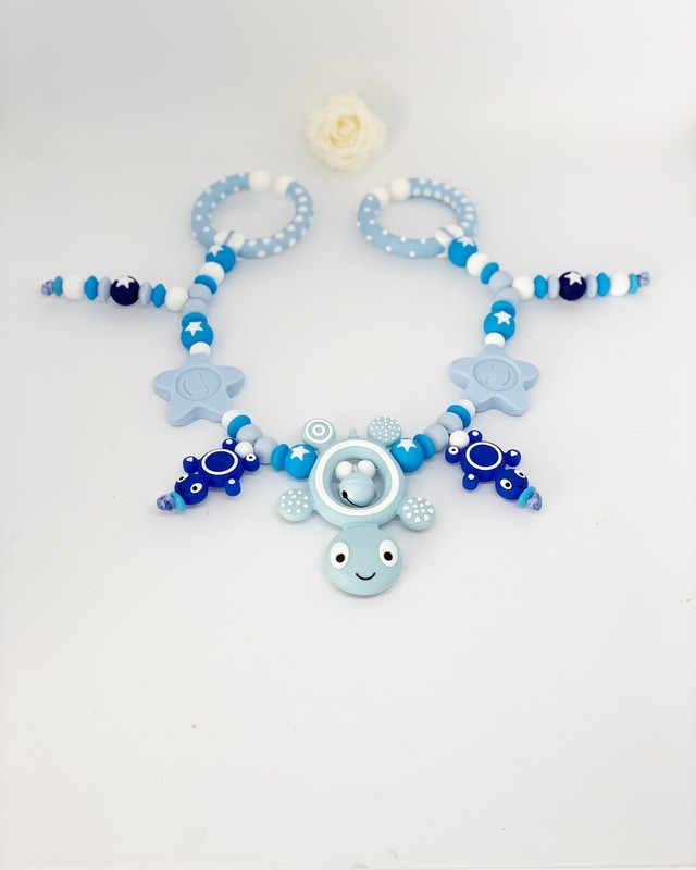 Kinderwagen Kette mit Trulla blau