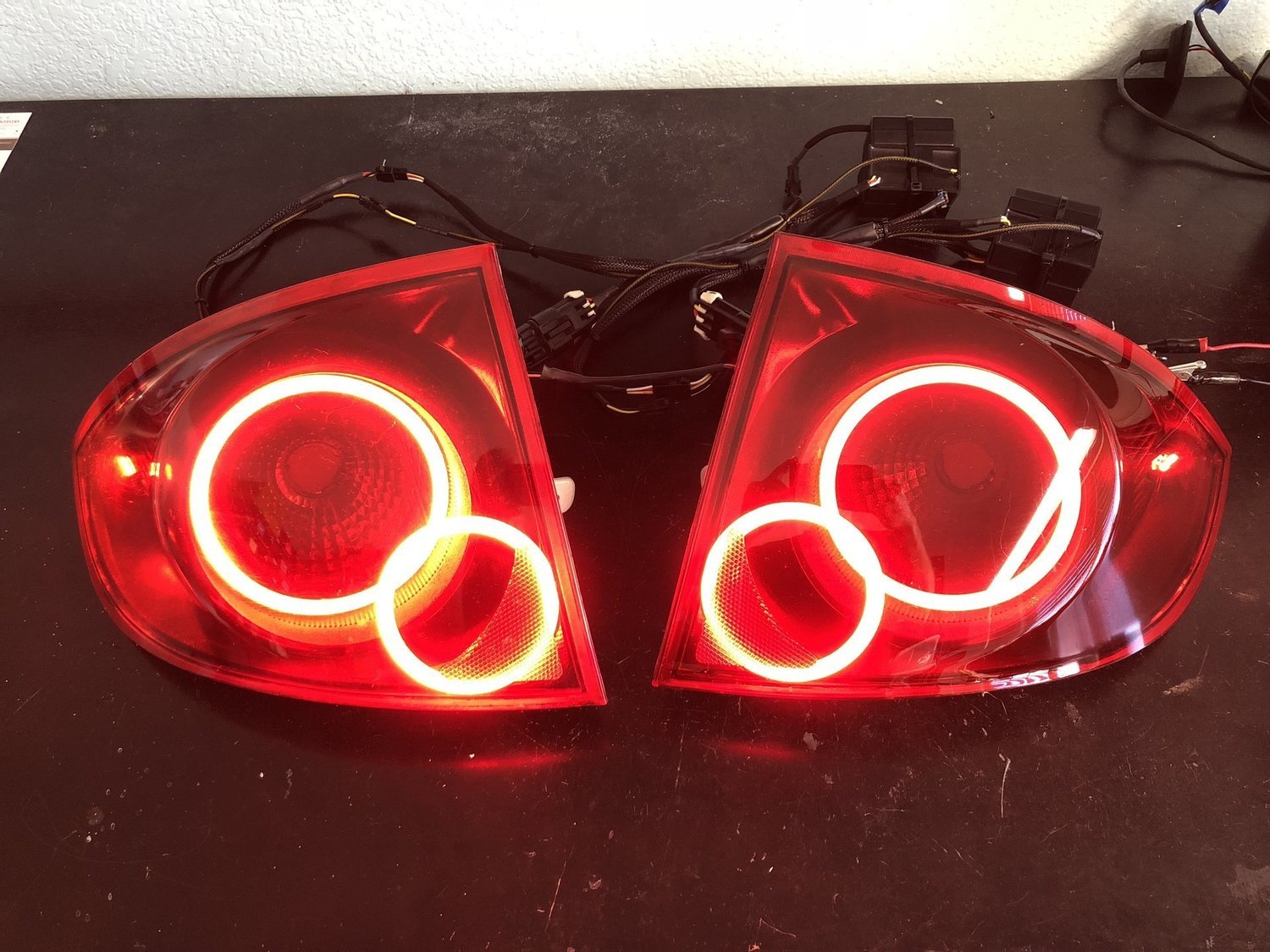 G5 coupe Halo style LED taillights, blacked out interiors, red lenses