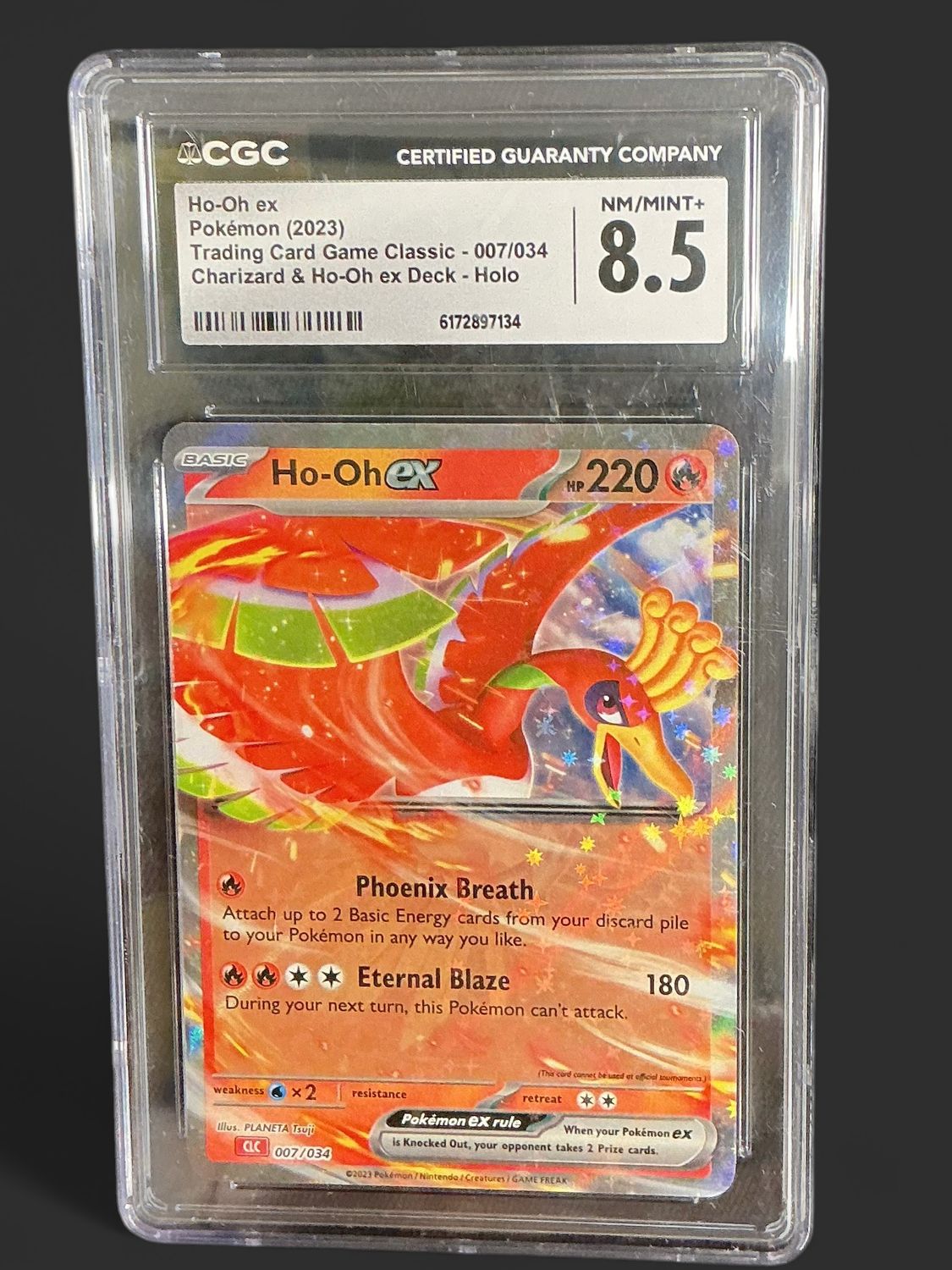 CGC NM/Mint+ 8.5 Ho-Oh Ex Holo 007/034