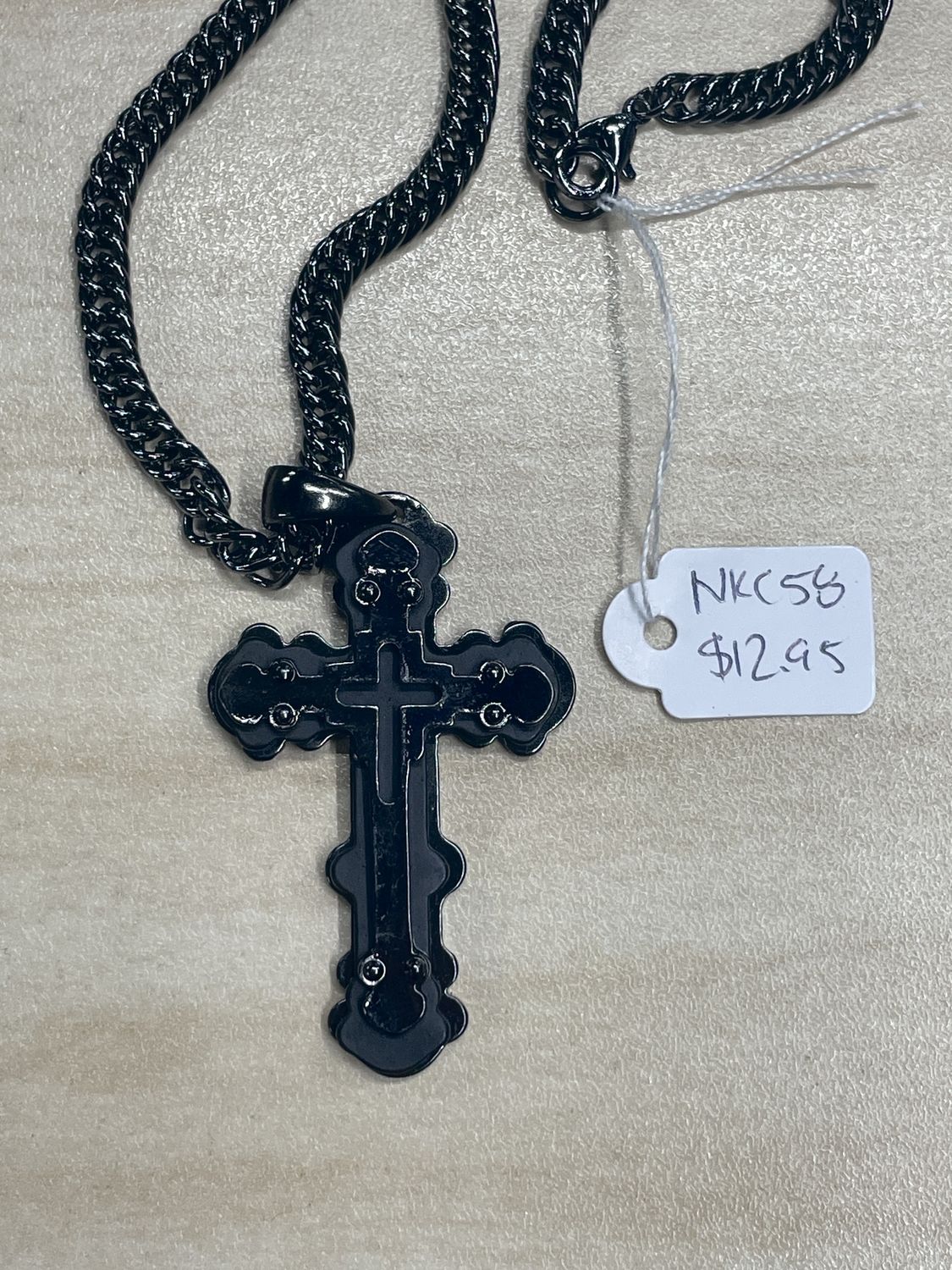 Raised 3-Layer Black Metal Cross w/ Rivets