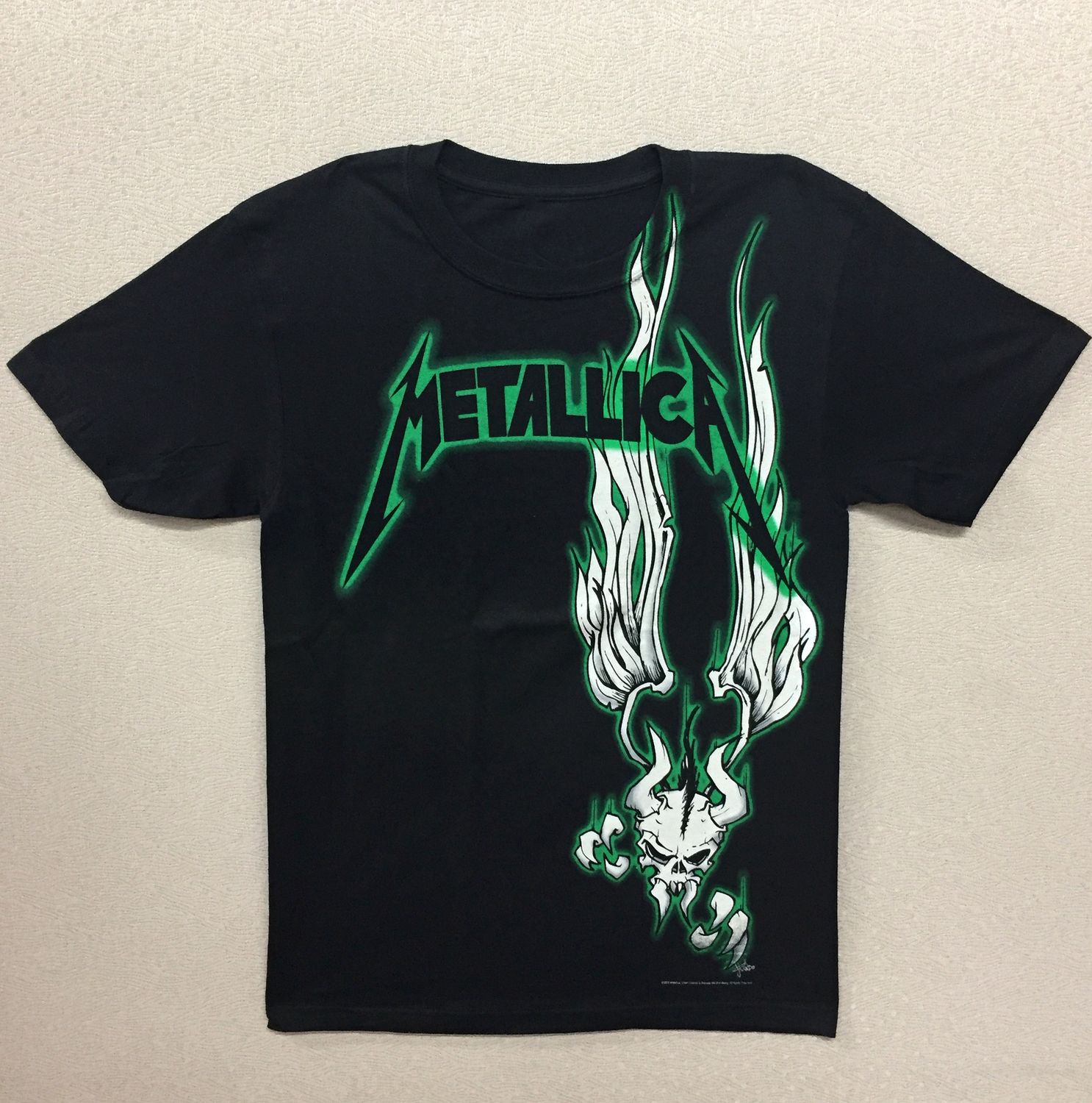 Metallica: Skull with Wings Glowing Green