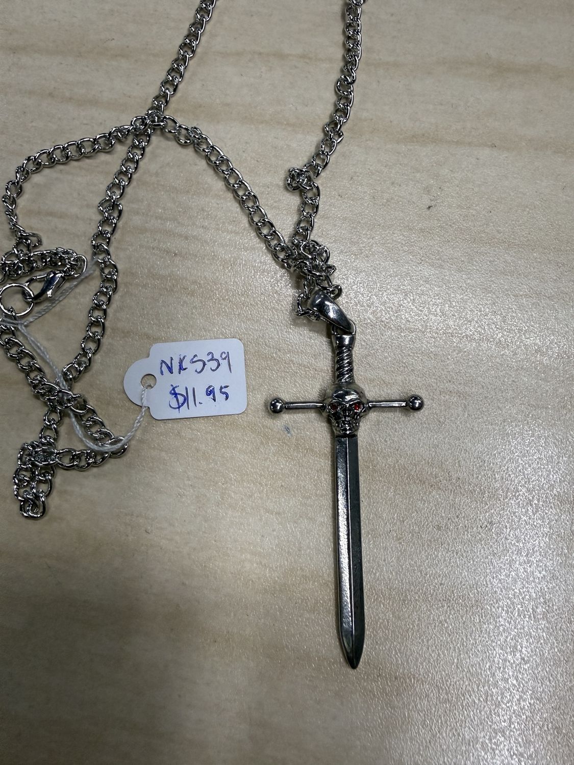 Skull w/ Red Eyes on Sword Hilt Pendant Necklace