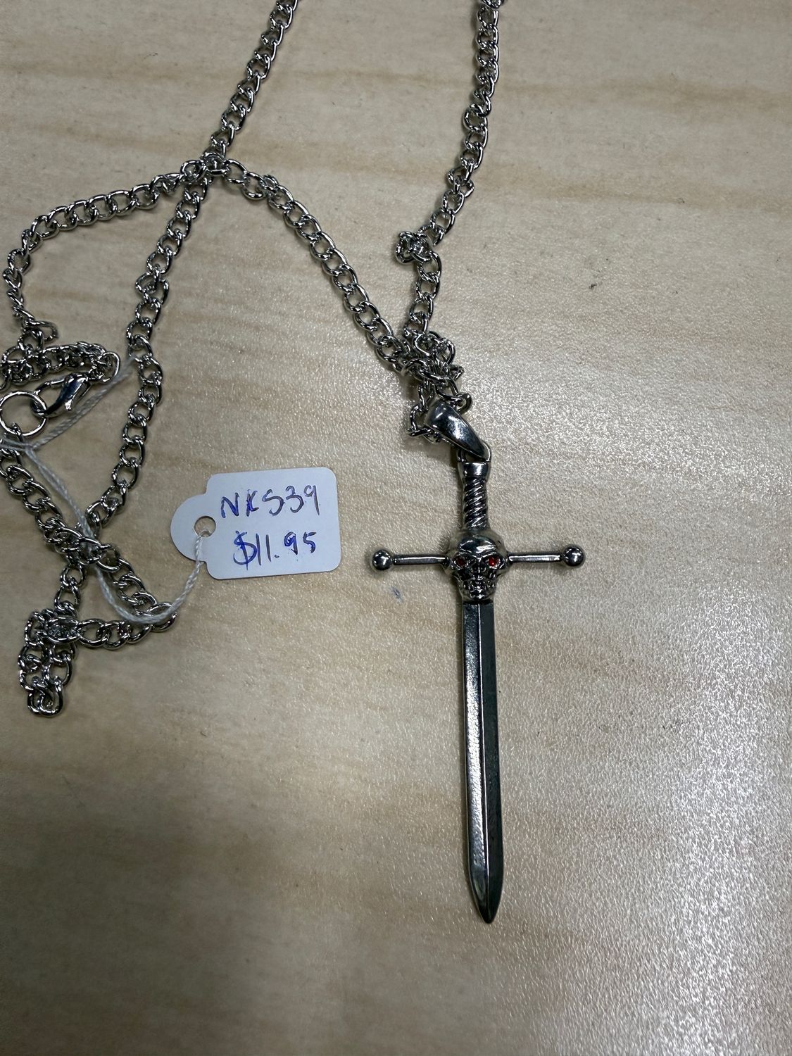 Skull w/ Red Eyes on Sword Hilt Pendant Necklace