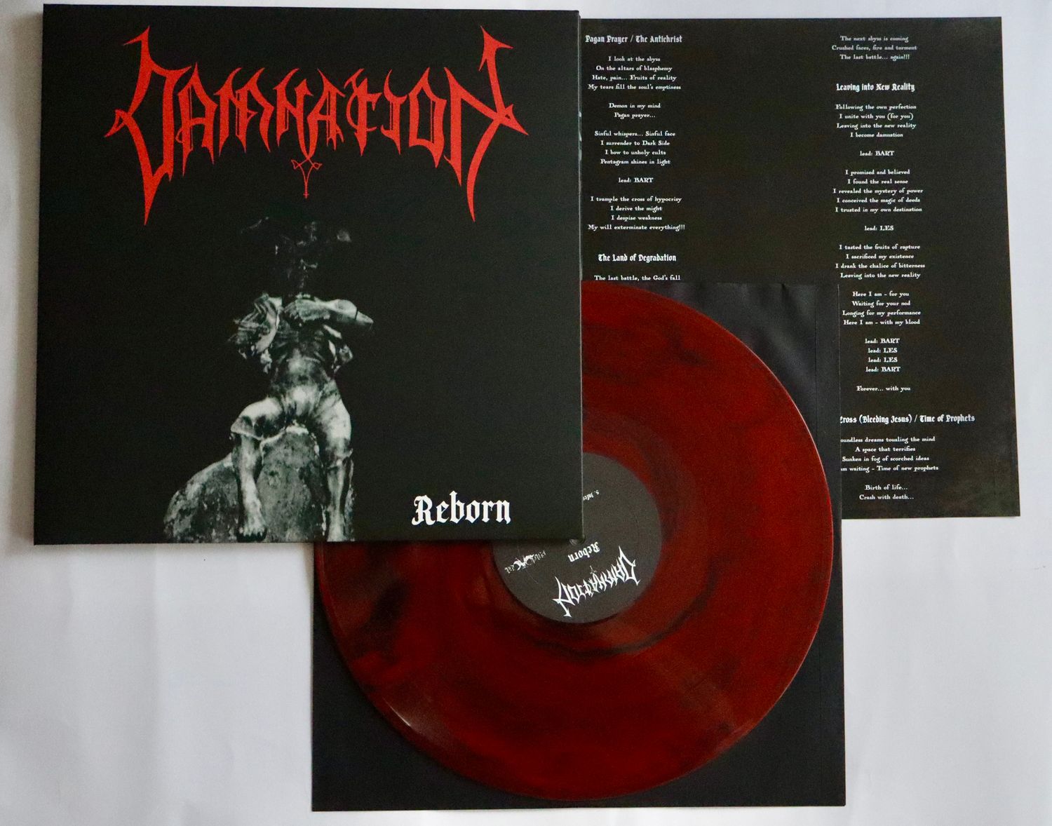 DAMNATION – Reborn... LP (BLACK/RED MARBLE)