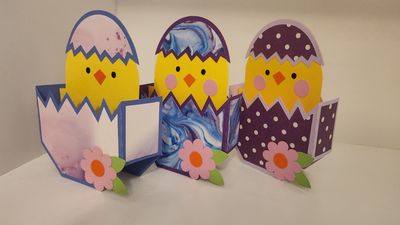 Chicks in cracked egg