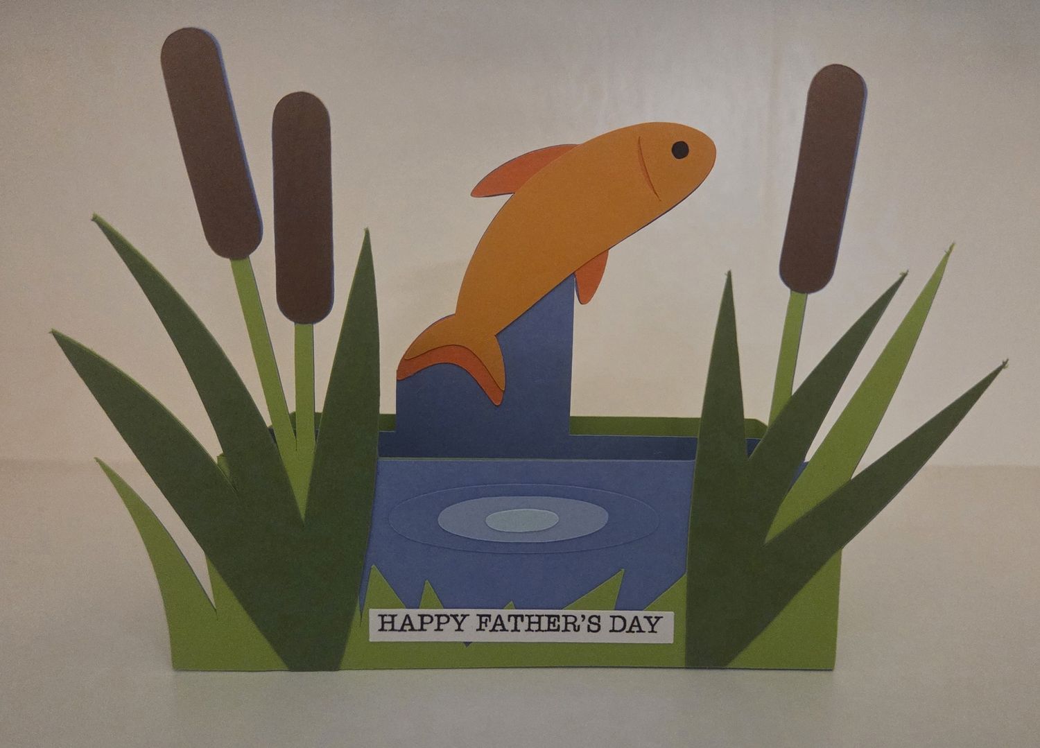 Fish emerging from a pond