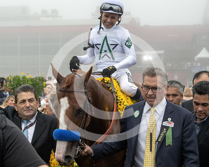 Justify and Mike Smith Enter the Winner's Circle