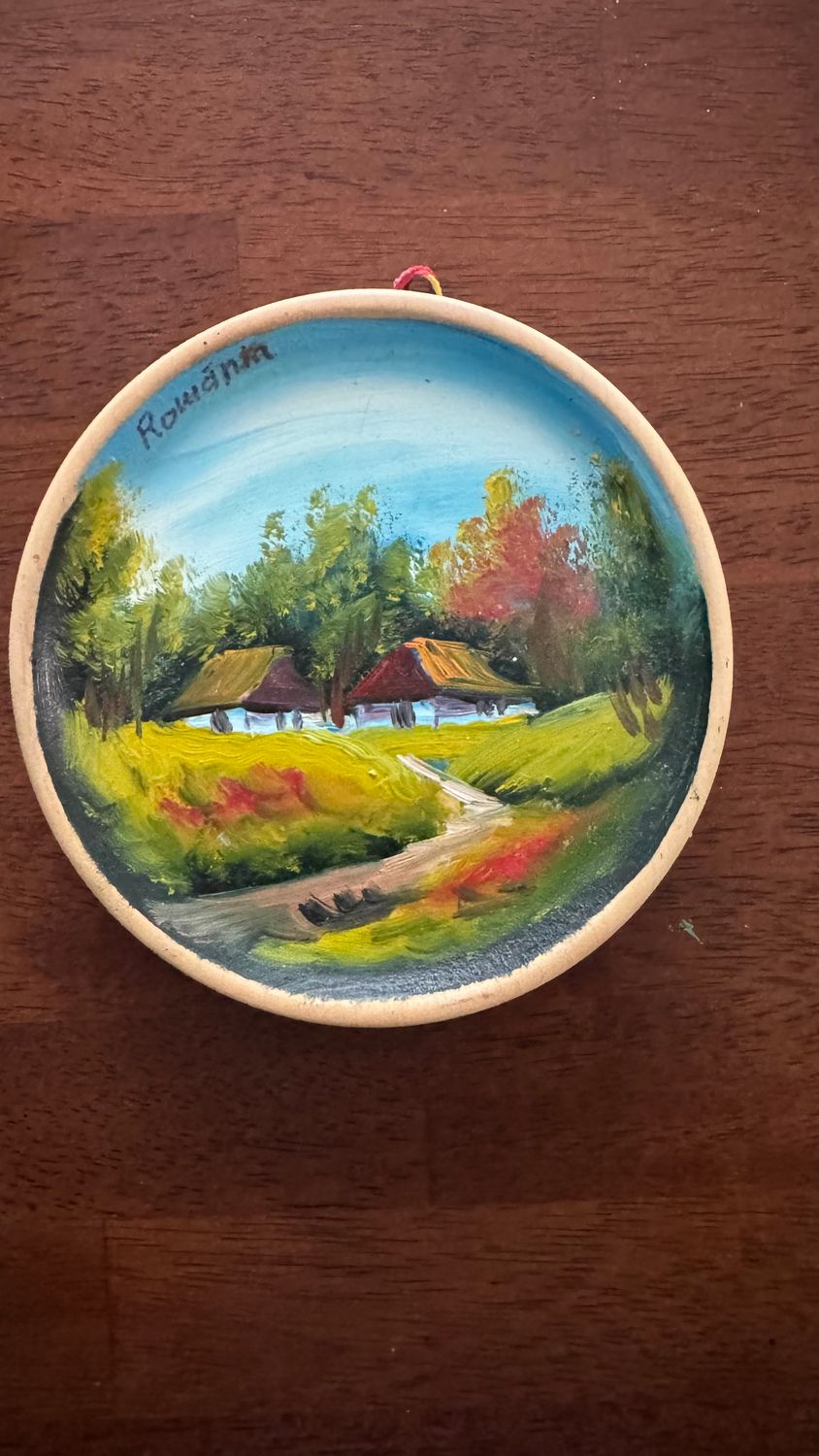 Traditional paint on wood plate