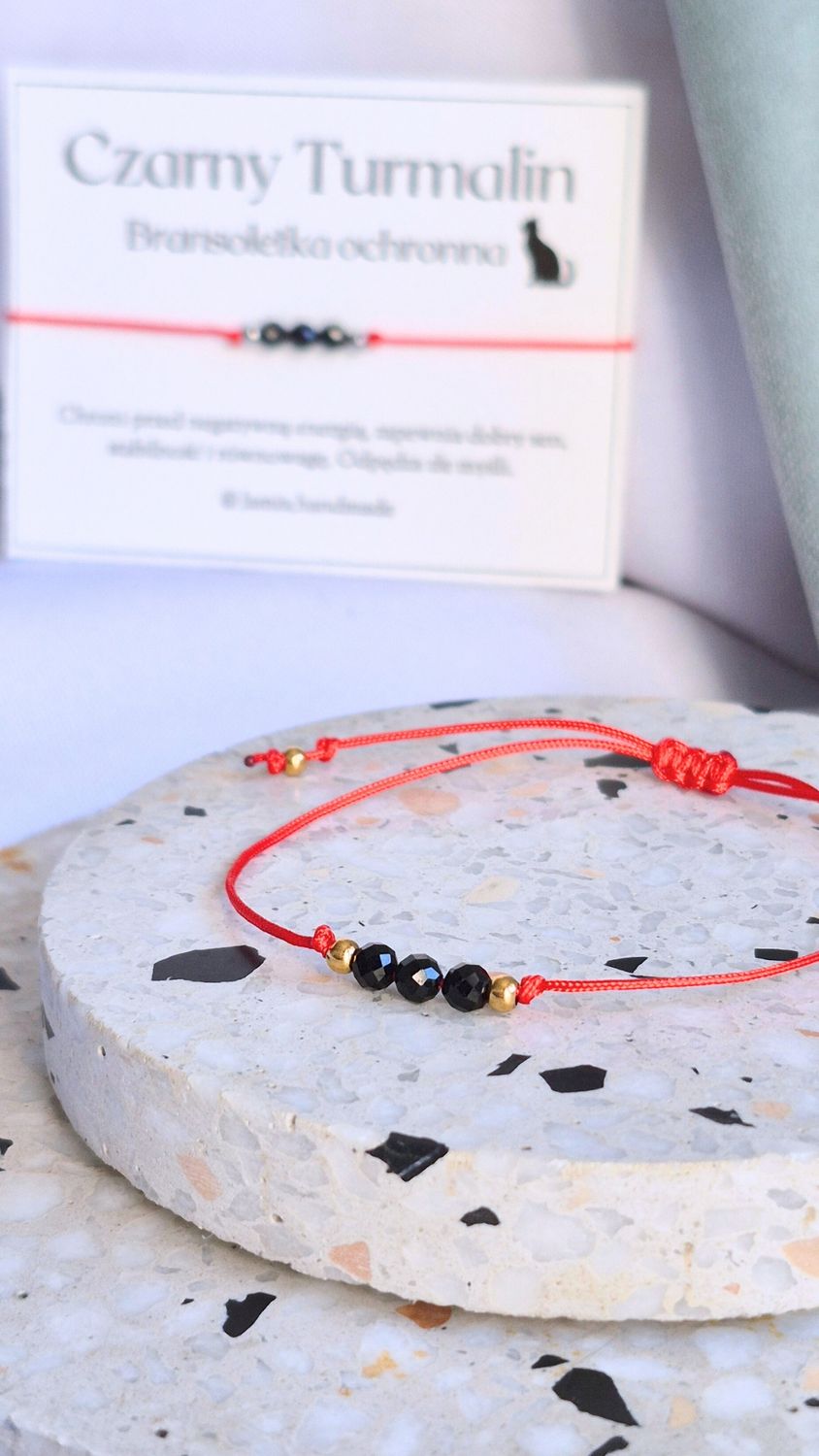 Bransoletka ochronna z zapięciem na sznurku nylonowym - złota