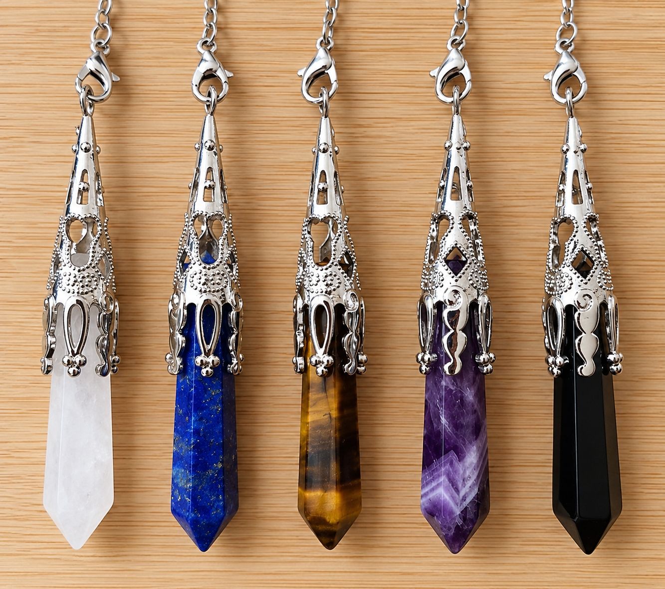 PENDULE LONGUE POINTE 7 CHAKRAS – ÉQUILIBRE ET HARMONIE PENDULE LONGUE POINTE 7 CHAKRAS – ÉQUILIBRE ET HARMONIE