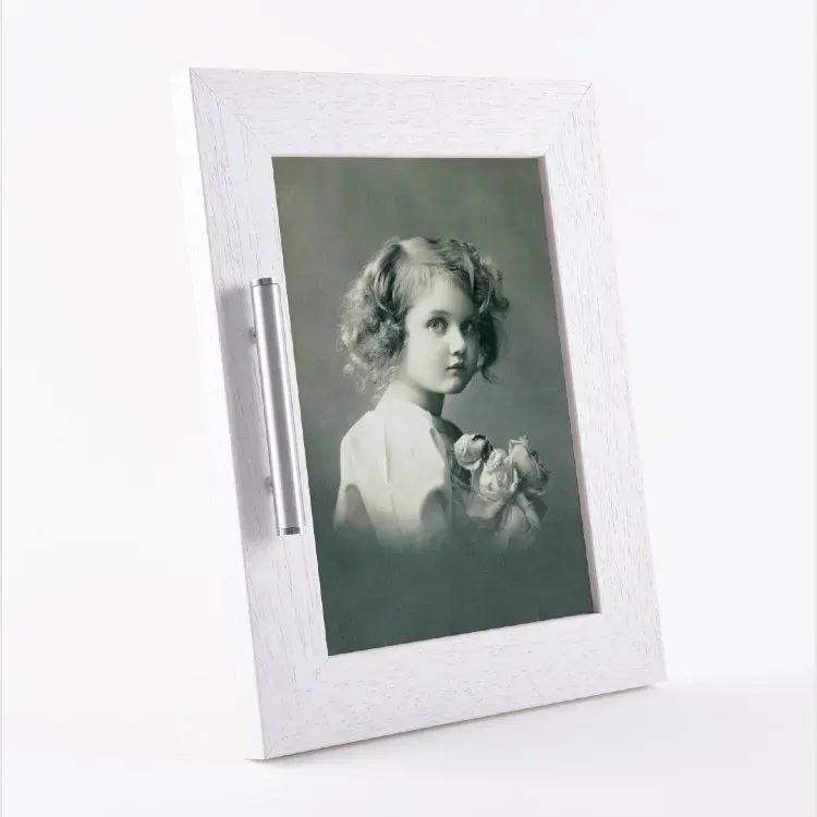 Fotolijst met wit kader + asbuis urn